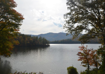 Serene lake view surrounded by autumn foliage